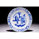 A Chinese blue and white plate with figures in the garden, Kangxi mark and of the period Dia.: 21 cm