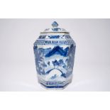 A Chinese hexagonal blue and white covered jar with landscape design, 19th C. H.: 25,5 cm
