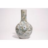 A Chinese crackle glaze tianqiuping vase with antiquities design, 19th C. H.: 43 cm Condition