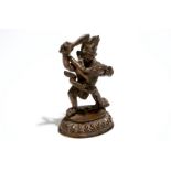 A Sino-Tibetan bronze figure of Mahakala with Sakti, 19th C. Dim.: 11 x 7 x 6 cm Condition reports