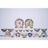 A varied lot of mostly Chinese bowls, plates and cups and saucers, 18/19th C. Dia.: 23 cm (the