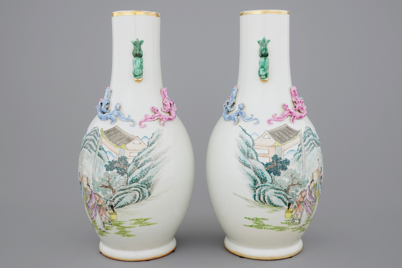 An unusual pair of Chinese famille rose landscape vases, early 20th C. H.: 46 cm - Dia.: 22 cm - Image 2 of 6