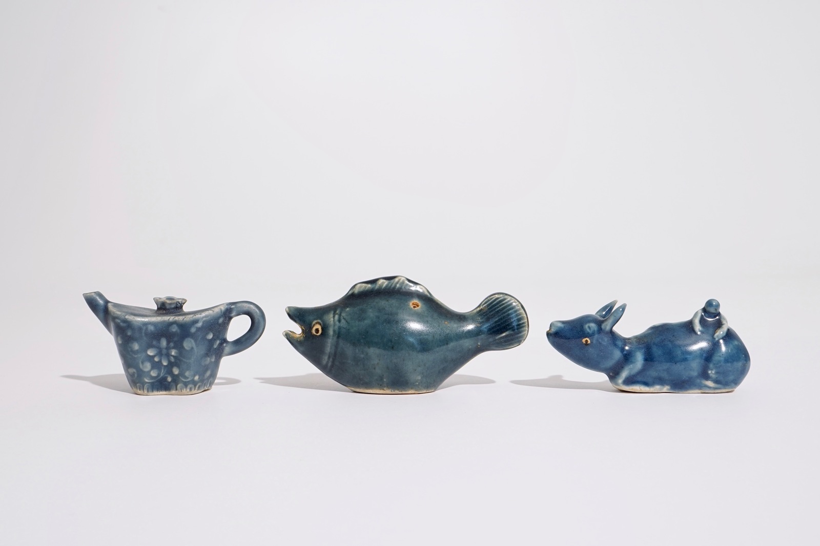 Three Chinese monochrome blue waterdroppers, 19/20th C. H.: 5 cm - L.: 10,5 cm - W.: 3,5 cm (the - Image 2 of 7