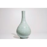 A Chinese monochrome celadon crackle glazed vase, 20th C. H.: 60 cm Condition reports and high