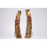 A pair of tall polychrome Chinese carved ivory figures of immortals, 19th C. Dim.: 61 x 15 x 12 cm