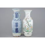 A tall Chinese famille rose vase and a blue and white one, 19/20th C. H.: 62 cm (the tallest)