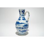 A Chinese blue and white jug with landscape design, Transitional period, Chongzhen H.: 24 cm