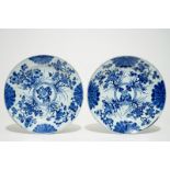 A pair of Chinese blue and white floral chargers, Kangxi Dia.: 37,5 cm Condition reports and high