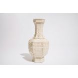 A Chinese white-glazed relief-decorated vase with text bands, 19th C. H.: 25 cm Condition reports