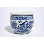 A blue and white Chinese fishbowl with birds among flowers, 19th C. Dia.: 36 cm - H.: 30,5 cm