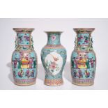 A pair of Chinese famille rose on turquoise ground vases, 19th C., and a vase with Qianlong mark,