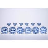 Six Chinese blue and white cups and saucers with figures in a garden, Kangxi Dia.: 11 cm (the