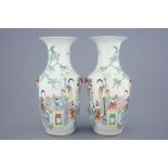 A pair of Chinese qianjiang cai vases with ladies and children, 19/20th C. H.: 45 cm Condition