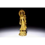 A Chinese gilt bronze figure of Tara standing on a lotus base, 19th C. H.: 27 cm Condition reports