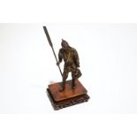 A Japanese bronze figure of a fisherman, signed Miyao, on a wooden stand Dim.: 39 x 20 x 15 cm