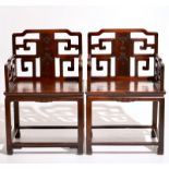 A pair of Chinese carved hardwood chairs, 19th C. L.: 62,5 cm - W.: 48,5 cm - H.: 95 cmSeat