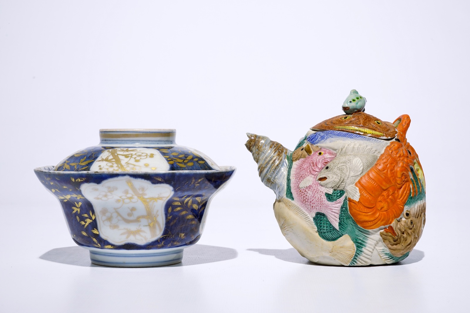 A Japanese Arita gilt blue and white covered bowl, Edo, 17/18th C. and a Banko biscuit teapot, - Image 2 of 7