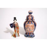 A Japanese Imari vase on stand and a Kutani model of a bijin, Meiji, 19th C. H.: 45 cm (the vase