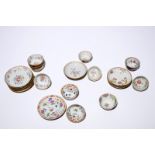 Eleven Chinese famille rose on capucin brown ground cups and saucers, Qianlong Dia.: 11 cm (