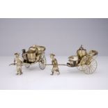 A pair of Chinese silver rickshaw-shaped pepper and salt shakers with a mustard container, 19th C.