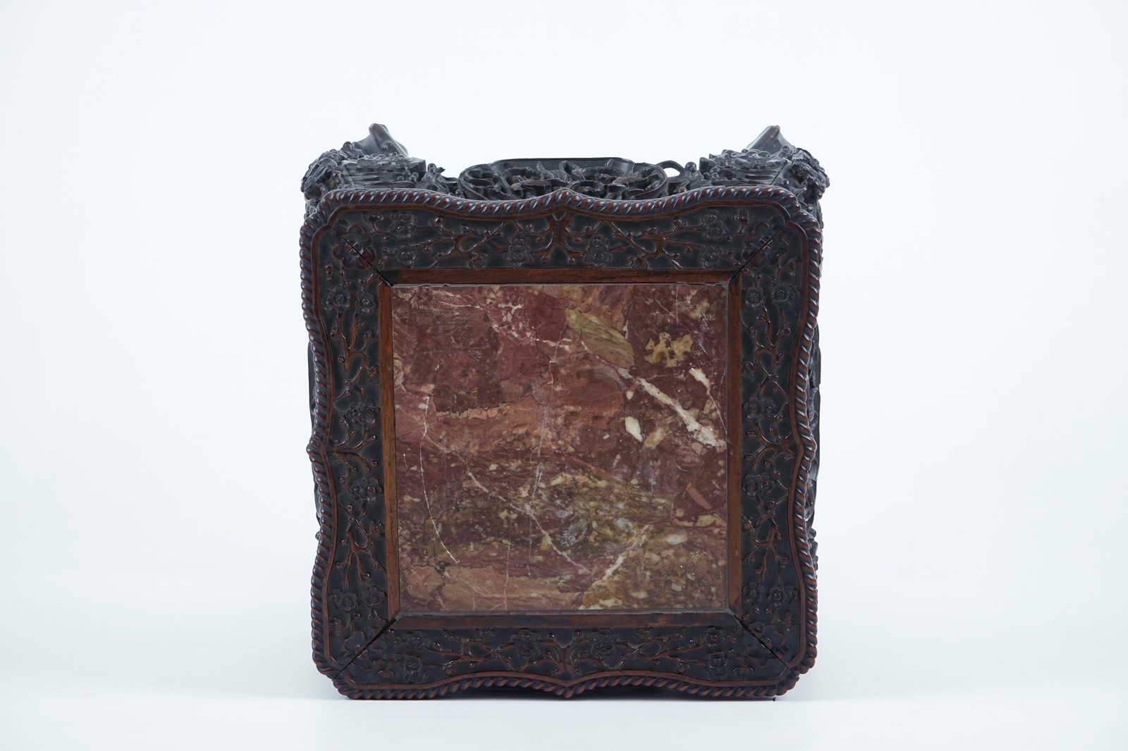 An intricately carved square Chinese wood stand with marble top, 19th C. H.: 63,5 cm - Dim.: 44 x 44 - Image 6 of 8