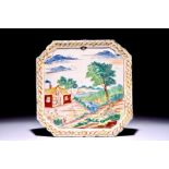 A square Dutch Delft polychrome petit feu plaque with a landscape, 18th C. Dim.: 27 x 27 cm