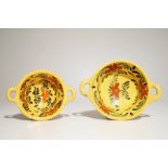 Two Dutch Delft yellow ground porringers, 18th C. L.: 21 cm - H.: 7 cm (largest)Provenance: One with