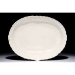 A large white Delft pointed oval dripping pan, 18th C. Dim.: 37,5 x 29 x 6 cm Condition reports