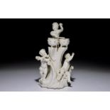 A white Delft group of putti playing music, probably German, 18th C. H.: 20 cm - L.: 12,5 cm - W.: