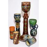 A large collection of Flemish pottery, mostly jardinieres on stands, early 20th C. H.: 165 cm (the