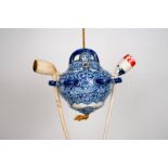 A very rare Dutch Delft blue and white clay pipe hanger, 17/18th C. Dim.: 16,5 x 15 cm Offered