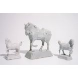 Three various white Dutch Delft horses, 18th C. Dim.: 20,5 x 20 x 9 cm Dim.: 11,5 x 11 x 5 cm