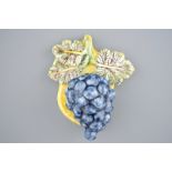 A rare intact Dutch Delft polychrome bunch of grapes, 18th C. Dim.: 14 (h) x 11 cm Condition reports