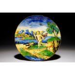 An Italian maiolica putto plate, Cantagalli, 19th C. Dia.: 22 cm Condition reports and high