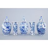 A blue and white five-piece garniture in Dutch Delft style, Samson, Paris, 19th C. H.: 29,5 and 20