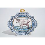 A polychrome Dutch Delft plaque with a cow, 18th C. Dim.: 25,5 x 22 cm Condition reports and high
