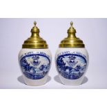 An exceptional pair of Dutch Delft blue and white tobacco jars "Het Wapen van Zeeland", 18th C.