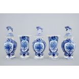 A blue and white Dutch Delft five-piece garniture with peacock's tails, 18th C. H.: 35,5 cm - H.: