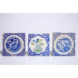 A set of three Dutch Delft tiles with a polychrome bird and chinoiserie design, early 17th C.