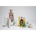 Six various Chinese famille rose and sancai-glazed figures, incl. a girl on an elephant, 19/20th C.