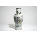 A Chinese famille rose vase with ladies in a garden, 19/20th C.