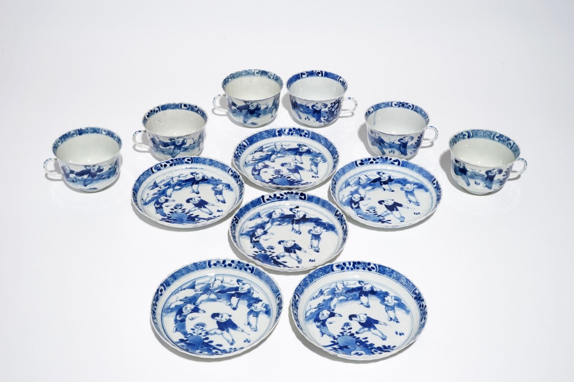 Six Chinese blue and white cups and saucers, Kangxi mark, 19th C.