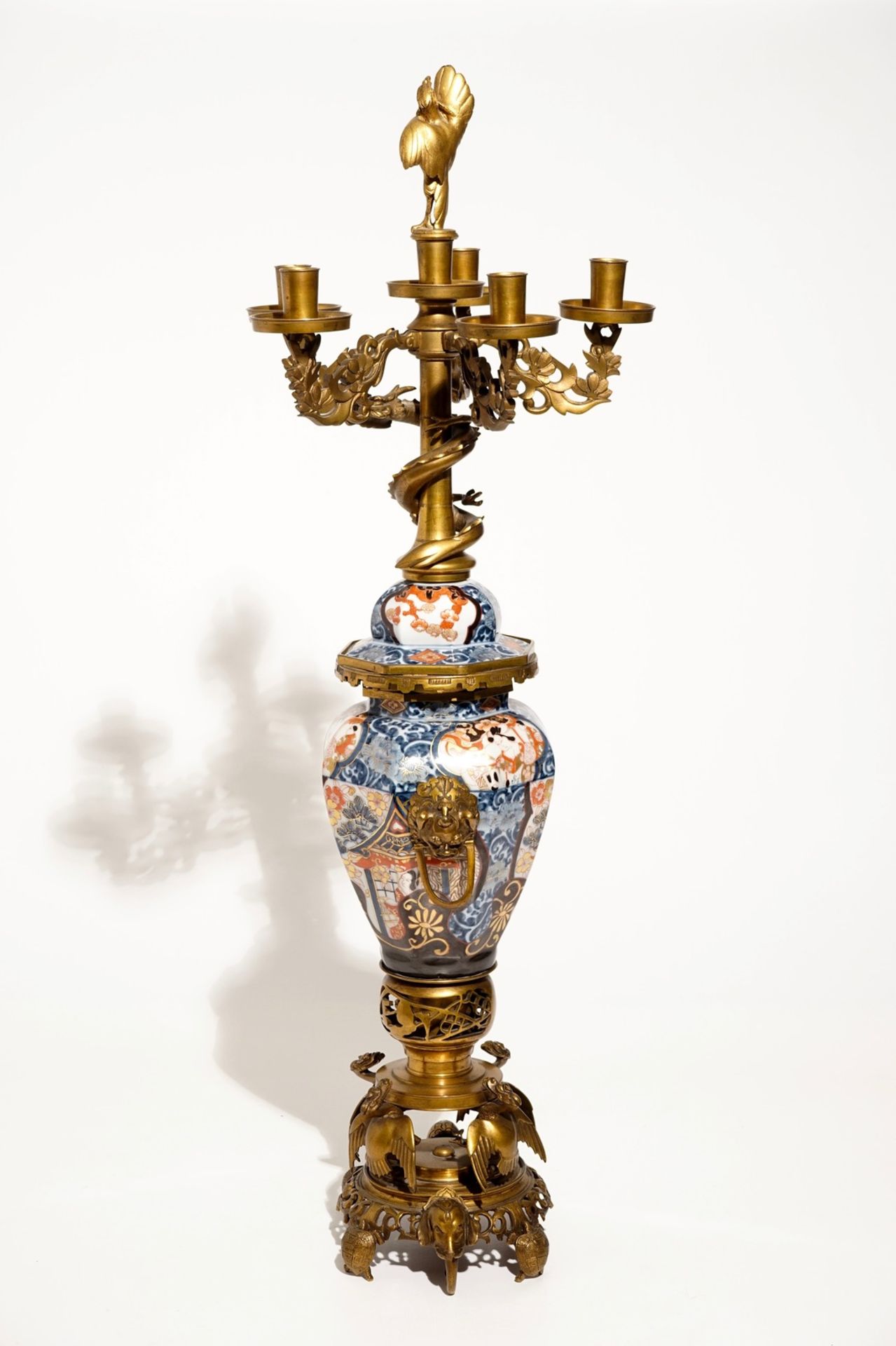 A large brass and gilt bronze-mounted Japanese Imari vase and cover candelabra, 19th C. - Image 2 of 6