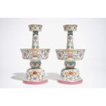 A pair of Chinese famille rose candlesticks, Jaiqing mark, 19/20th C.
