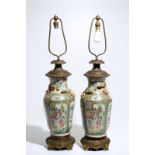 A pair of bronze-mounted Chinese Canton famille rose vases, transformed into lamps, 19th C.