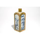 A square Japanese Arita blue and white bottle with biscuit frame, Edo, 17/18th C.