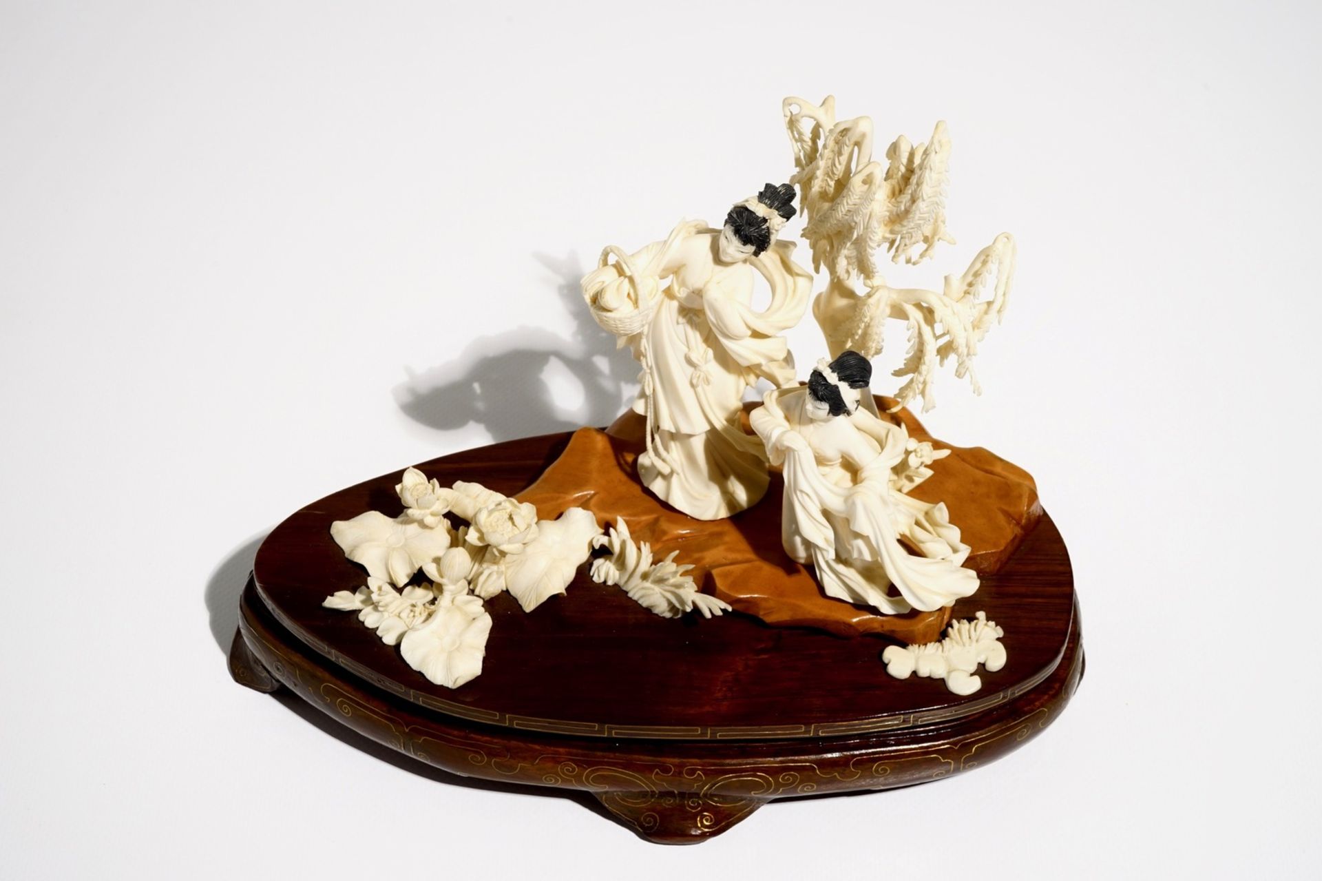 A Chinese carved ivory group of two ladies on wooden base, 2nd quarter 20th C. - Image 5 of 6