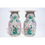 A pair of Chinese famille rose vases with birds, 19th C.