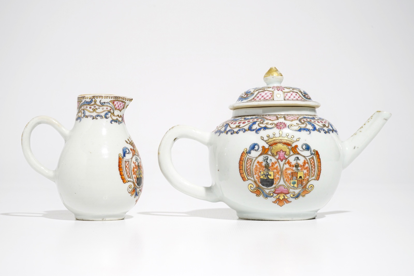 A Chinese famille rose armorial teapot and milk jug, Qianlong - Image 4 of 7