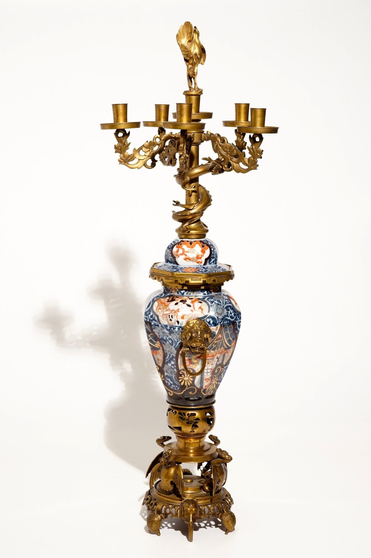 A large brass and gilt bronze-mounted Japanese Imari vase and cover candelabra, 19th C. - Image 4 of 6